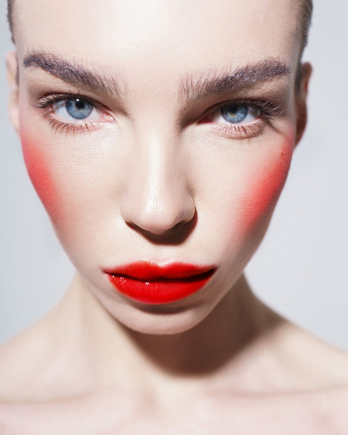 Beauty close-up with red blush and lips